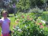 Thais and her blooming flower garden.